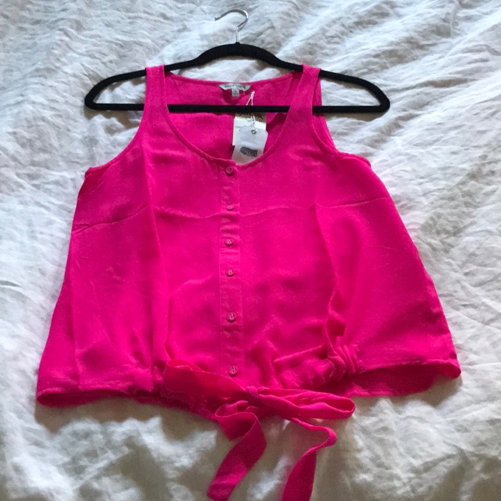 Button up tank top with tie in the front.